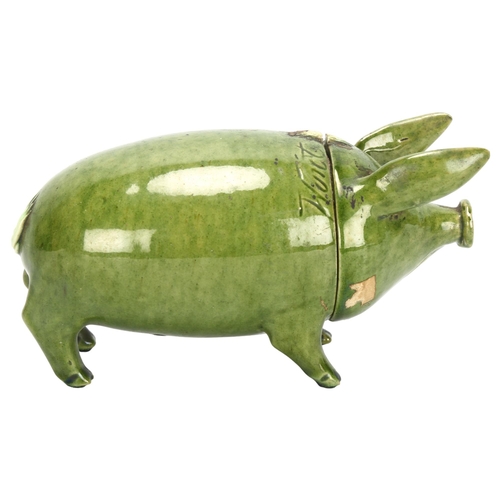 62 - A Rye Pottery green glaze Sussex pig, with detachable head, inscribed 