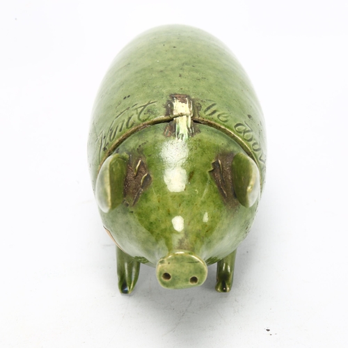 62 - A Rye Pottery green glaze Sussex pig, with detachable head, inscribed 