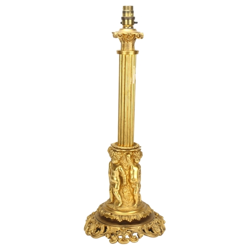 65 - A large ormolu Corinthian column table lamp, with relief putti support and foliate base, height excl... 