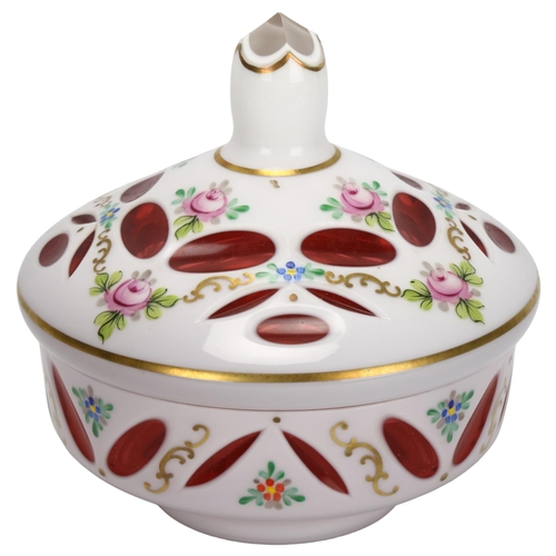 74 - A 19th century Bohemian milk and cranberry flashed glass sweetmeat jar and cover, with hand painted ... 