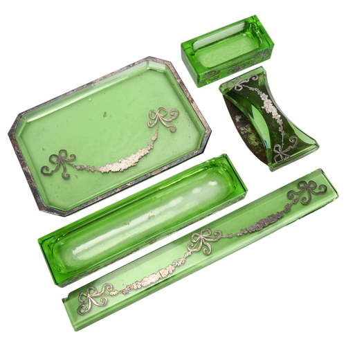 75 - An Art Deco silver overlaid green glass desk set, comprising paperweight, pen tray, desk blotter, in... 