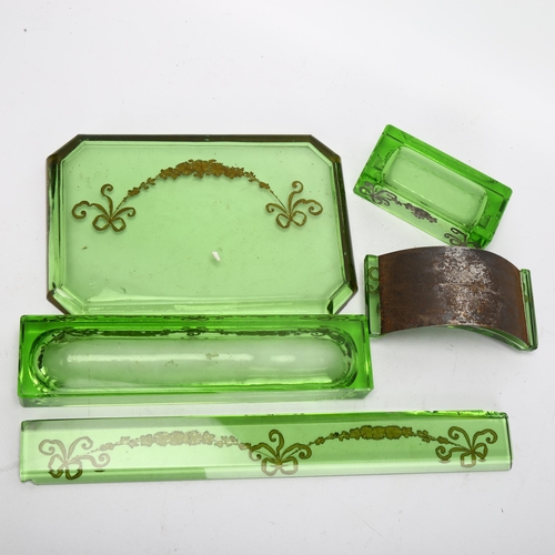 75 - An Art Deco silver overlaid green glass desk set, comprising paperweight, pen tray, desk blotter, in... 