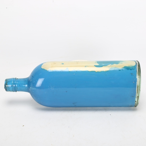 76 - A handmade ship in a bottle, length 30cm