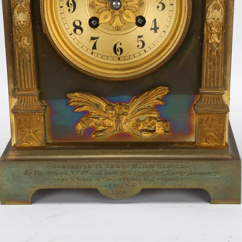 83 - MILITARY INTEREST - a gilt-brass architectural 8-day mantel clock, with presentation inscription 