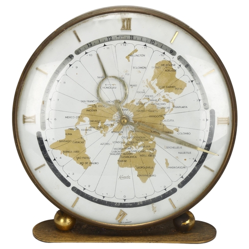 84 - KUNDO - a mid-century German brass world clock, with applied Roman numerals, diameter 24cm