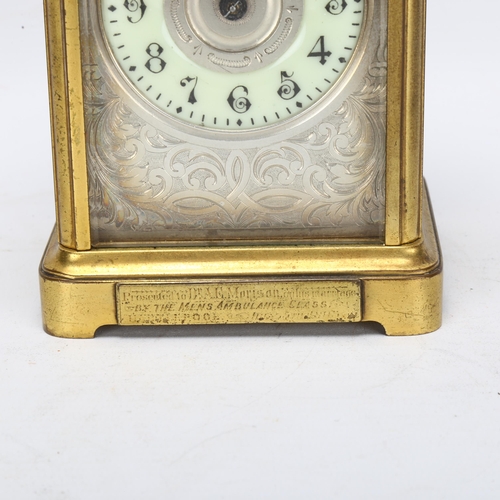 85 - A 19th century brass-cased carriage clock, foliate engraved silvered dial with enamel chapter ring a... 