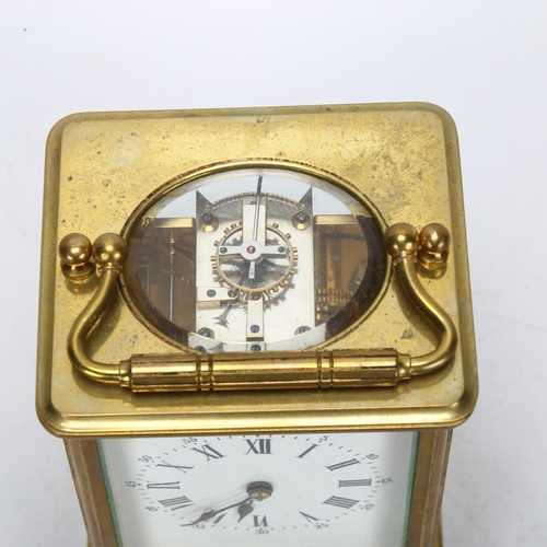 86 - A 19th century brass-cased carriage clock, white enamel dial with Roman numeral hour markers and mov... 