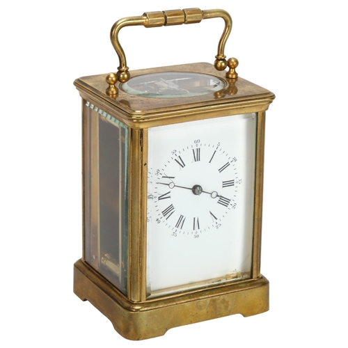 88 - A brass-cased carriage clock, white enamel dial with Roman numeral hour makers, back plate no. 613, ... 