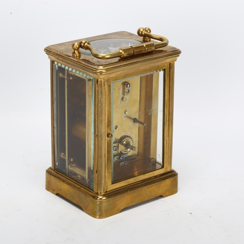 88 - A brass-cased carriage clock, white enamel dial with Roman numeral hour makers, back plate no. 613, ... 