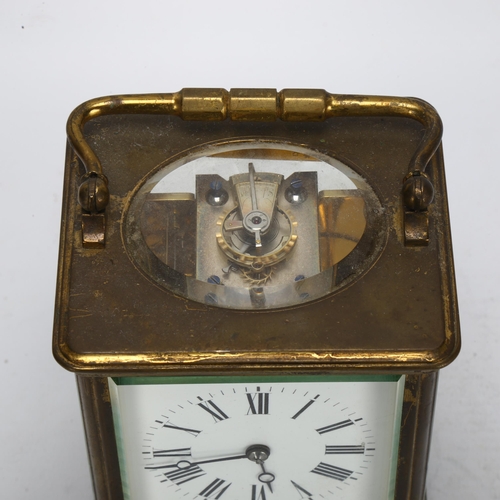 90 - A 19th century French brass-cased carriage clock, by Hall & Co of Paris, white enamel dial with Roma... 