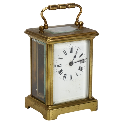 91 - A French brass-cased carriage clock, white enamel dial with Roman numeral hour markers, case height ... 