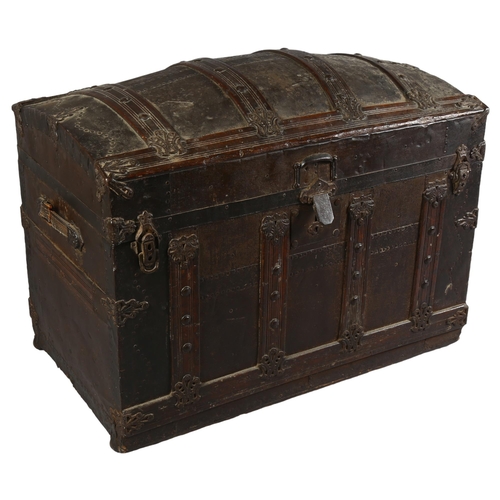 94 - A large 19th century metal-bound dome-top travelling trunk, in the style of Martin Maier & Co, with ... 