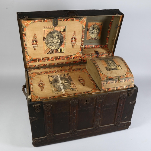 94 - A large 19th century metal-bound dome-top travelling trunk, in the style of Martin Maier & Co, with ... 