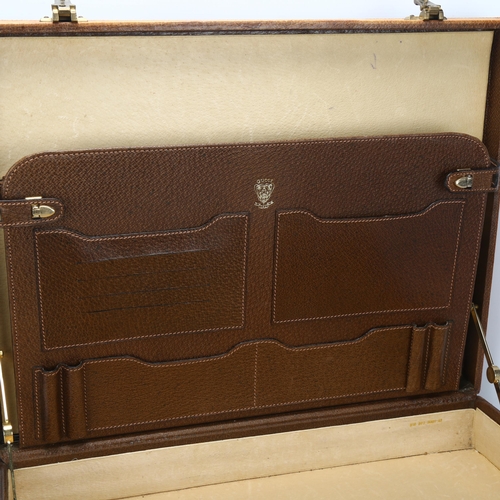 96 - GUCCI - a Vintage tan pig-skin briefcase, with combination lock, 43cm x 33cm