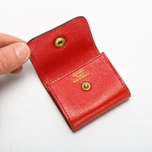 97 - HERMES - a French miniature red leather notebook case, 5.5cm x 5cm, boxed