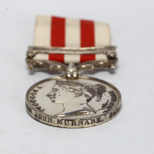 139 - An 1857/58 India Mutiny medal with Lucknow bar, to 9337 Gunner John Murnane, Bengal Artillery