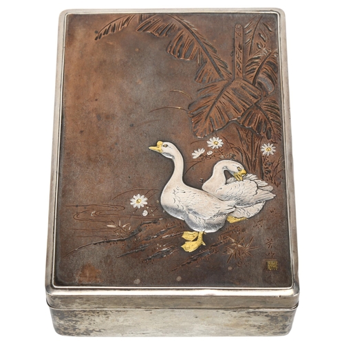 146 - An early 20th century Japanese Shakudo box, with silver body and gold/copper detail, maker's mark to... 