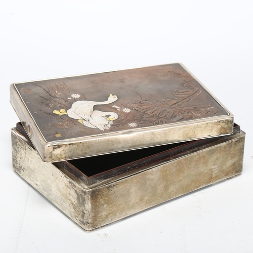 146 - An early 20th century Japanese Shakudo box, with silver body and gold/copper detail, maker's mark to... 