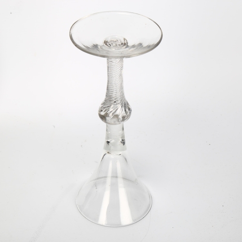 148 - An 18th century baluster air twist wine / cordial glass, height 18cm