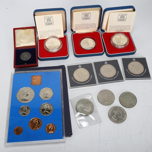 168 - A collection of British commemorative coins, 3 silver proof crowns and Victoria Diamond Jubilee case... 