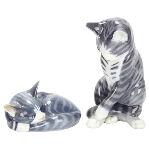 177 - A pair of Royal Copenhagen ceramic cats, maker's mark to base, tallest 18cm