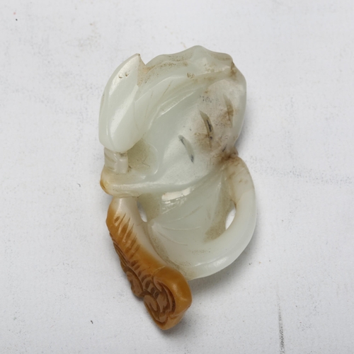 180 - A Chinese carved pale green and russet jade bat group, length 6.5cm