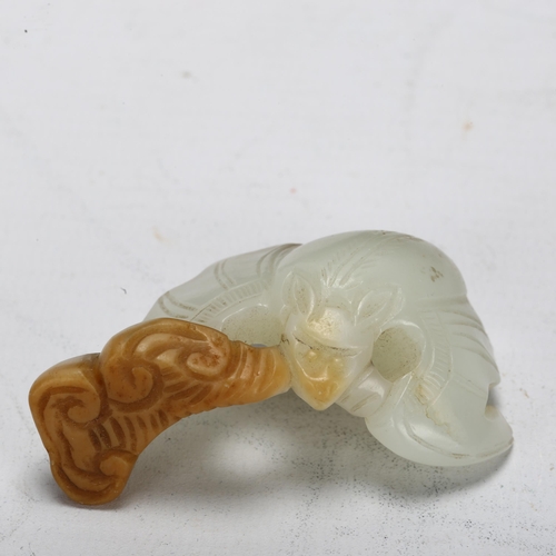 180 - A Chinese carved pale green and russet jade bat group, length 6.5cm