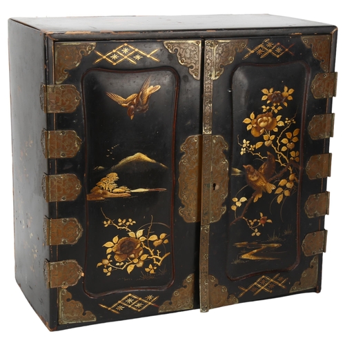 195 - A 19th century Japanese lacquer table-top jewellery cabinet, with floral and bird decoration, brass ... 