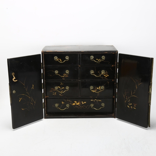 195 - A 19th century Japanese lacquer table-top jewellery cabinet, with floral and bird decoration, brass ... 