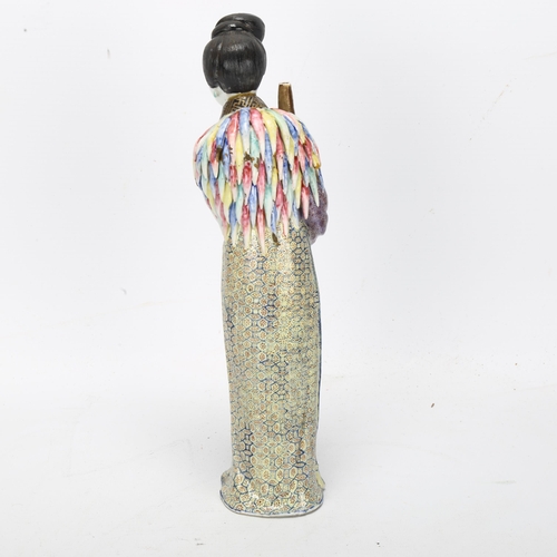 197 - A 19th century Chinese porcelain figure with fine enamel decoration, height 25cm