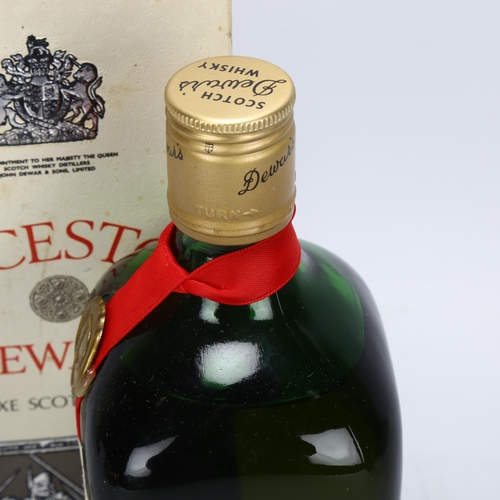 202 - A bottle of Dewar's De Luxe Ancestor blended whisky, 70% proof, 26 2/3 oz,