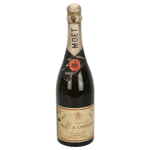 204 - A bottle of 1953 Moet & Chandon Dry Imperial Champagne