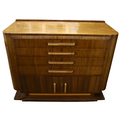 222 - An Art Deco cutlery canteen sideboard in mahogany veneer, with full canteen of cutlery for 12 people... 