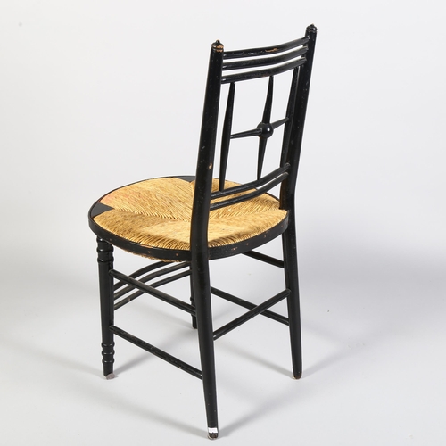 224 - A Morris & Company Arts and Crafts chair by Ford Maddox Brown, ebonised frame with rush seat, height... 