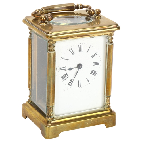 242 - A French brass-cased carriage clock, white enamel dial with Roman numerals and bevelled-glass exhibi... 