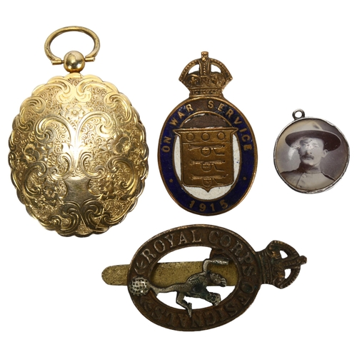 252 - A Royal Corps of Signals cap badge, and 1915 Ordnance badge, together with 2 pendants with related p... 