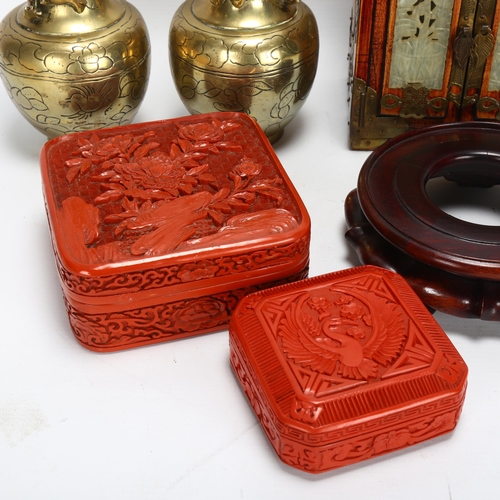 264 - A Chinese table-top cabinet with jade door panels, 2 cinnabar boxes, a pair of brass vases and hardw... 