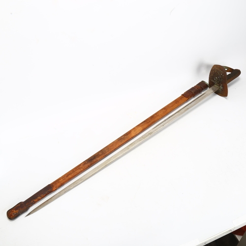 272 - An 1897 pattern British Officer's sword in leather wood scabbard, length 102cm