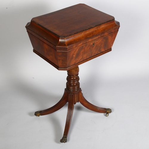 279 - A Regency flame mahogany teapoy, with fitted interior on reeded splayed legs, height 75cm