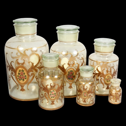 280 - A set of 6 graduated Antique French glass perfumery jars, with hand painted gilt decoration, tallest... 