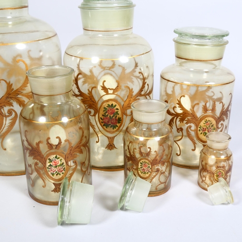 280 - A set of 6 graduated Antique French glass perfumery jars, with hand painted gilt decoration, tallest... 