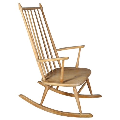 494 - Aksel Hansson, Norway, a 1930's pine rocking chair with straw seat, no makers marks, height 80cm