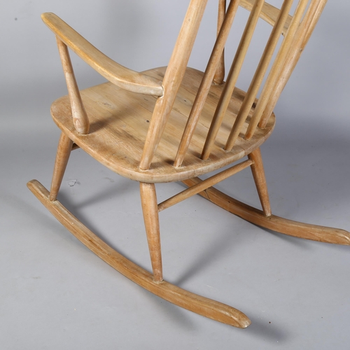 494 - Aksel Hansson, Norway, a 1930's pine rocking chair with straw seat, no makers marks, height 80cm