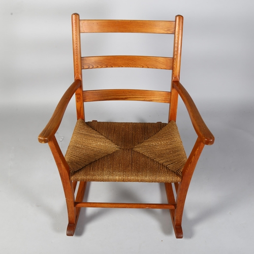 495 - A 1960s' Scandinavian rocking chair, height 110cm