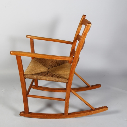 495 - A 1960s' Scandinavian rocking chair, height 110cm