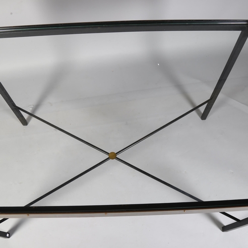 521 - A mid-century Italian iron and brass table with glass top and cross stretcher, 116 x 70cm, height 74... 