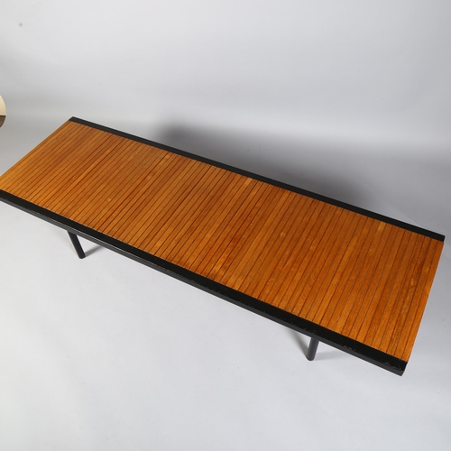 522 - A mid-century teak and iron coffee table, of teak block construction bound with iron edging, British... 