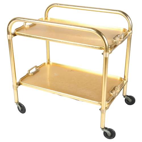 531 - A mid-century Lumium anodised aluminium folding trolley or bar cart, with removeable trays, and make... 