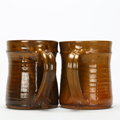 411 - Clive Bowen, a pair of studio pottery mugs, makers mark to base, height 10.5cm