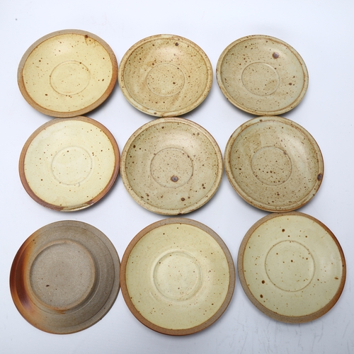 412 - Ray Finch for Winchcombe Pottery, a set of 9 stoneware cups and saucers, pottery and makers mark to ... 